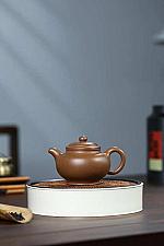 A new friend plays with it; in fact, it's a half-manual teapot.