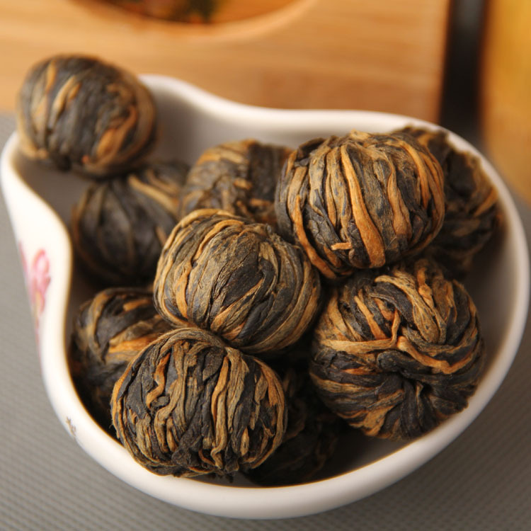 Yunnan Phoenix Qing Hong Cha Handmade Red Tea Small Golden Balls